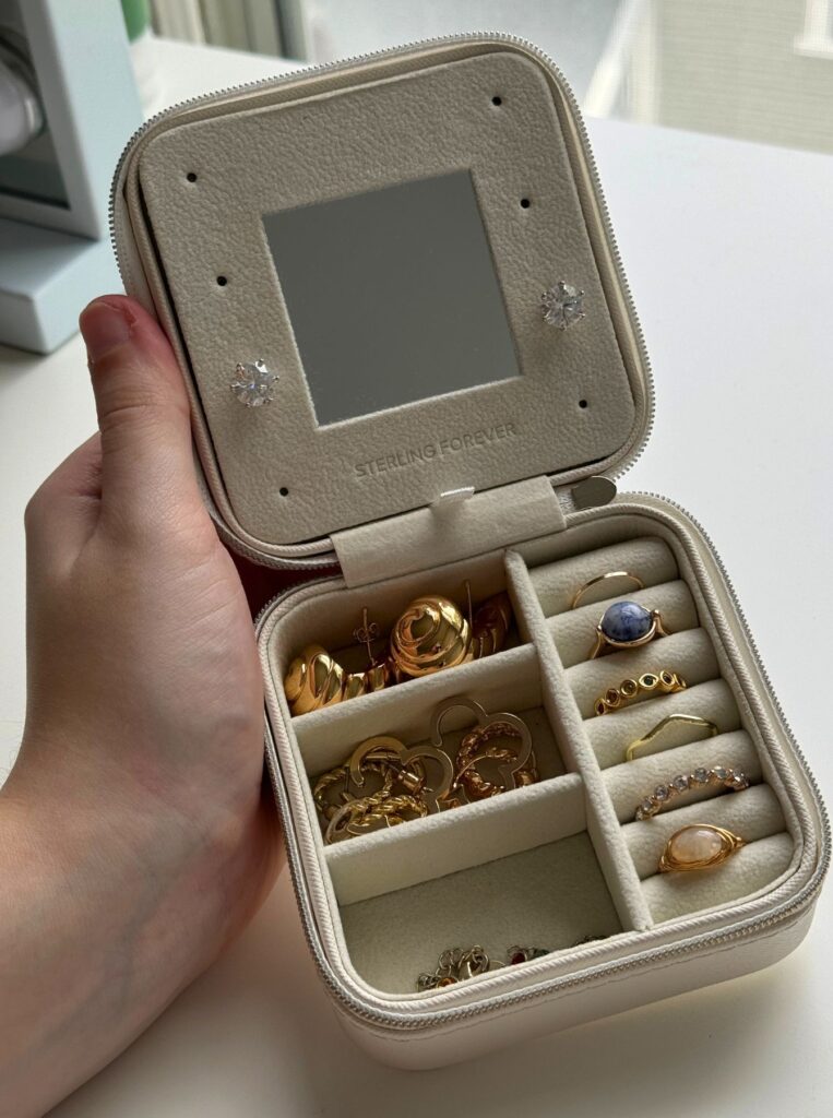 accessory box containing rings and earrings