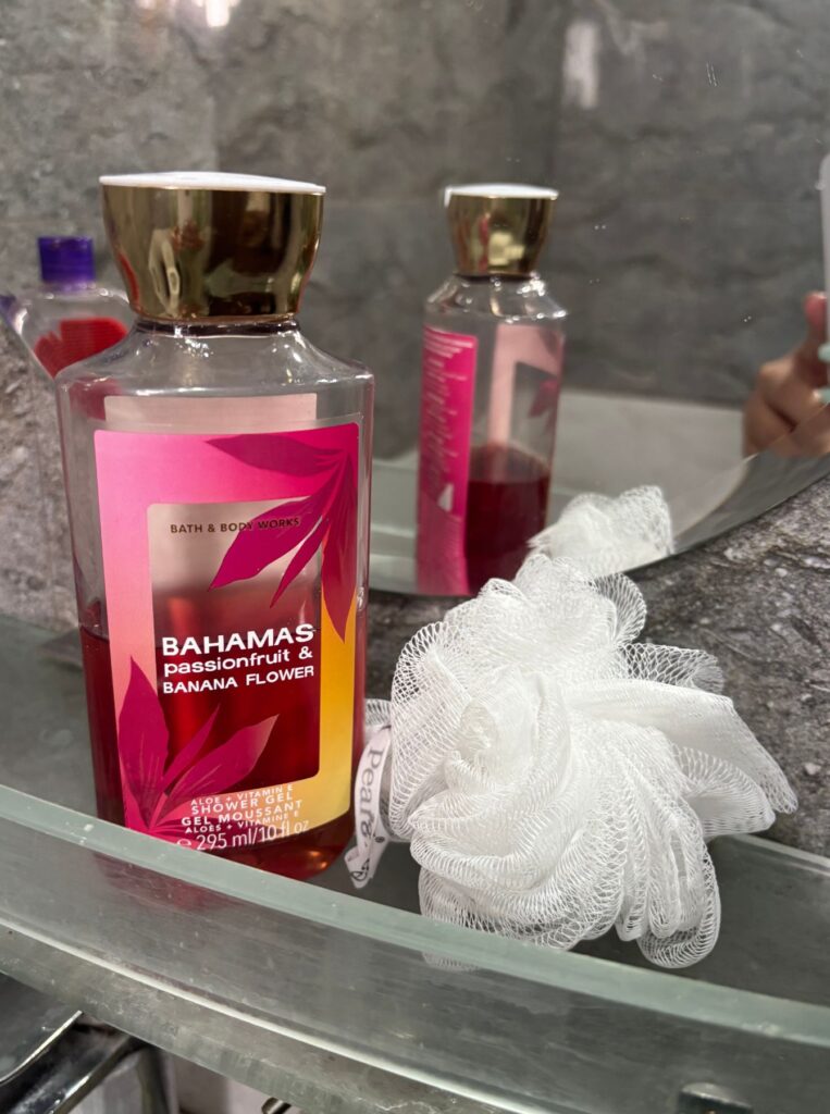 Bahamas passionfruit & banana flower shower gel, with white loofah