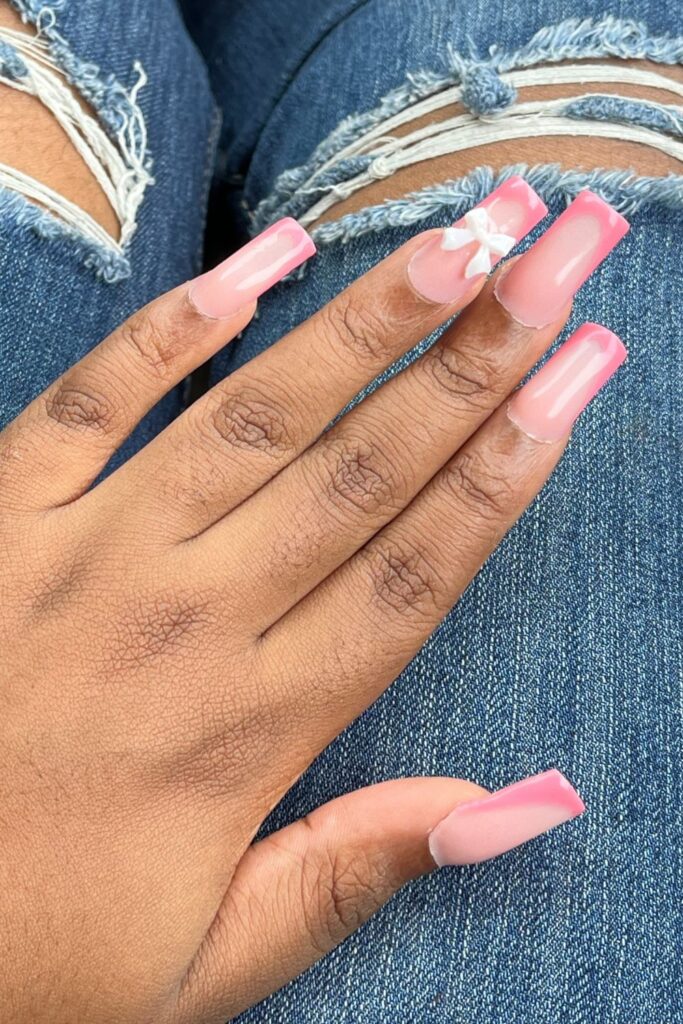 pink bowed up french nails